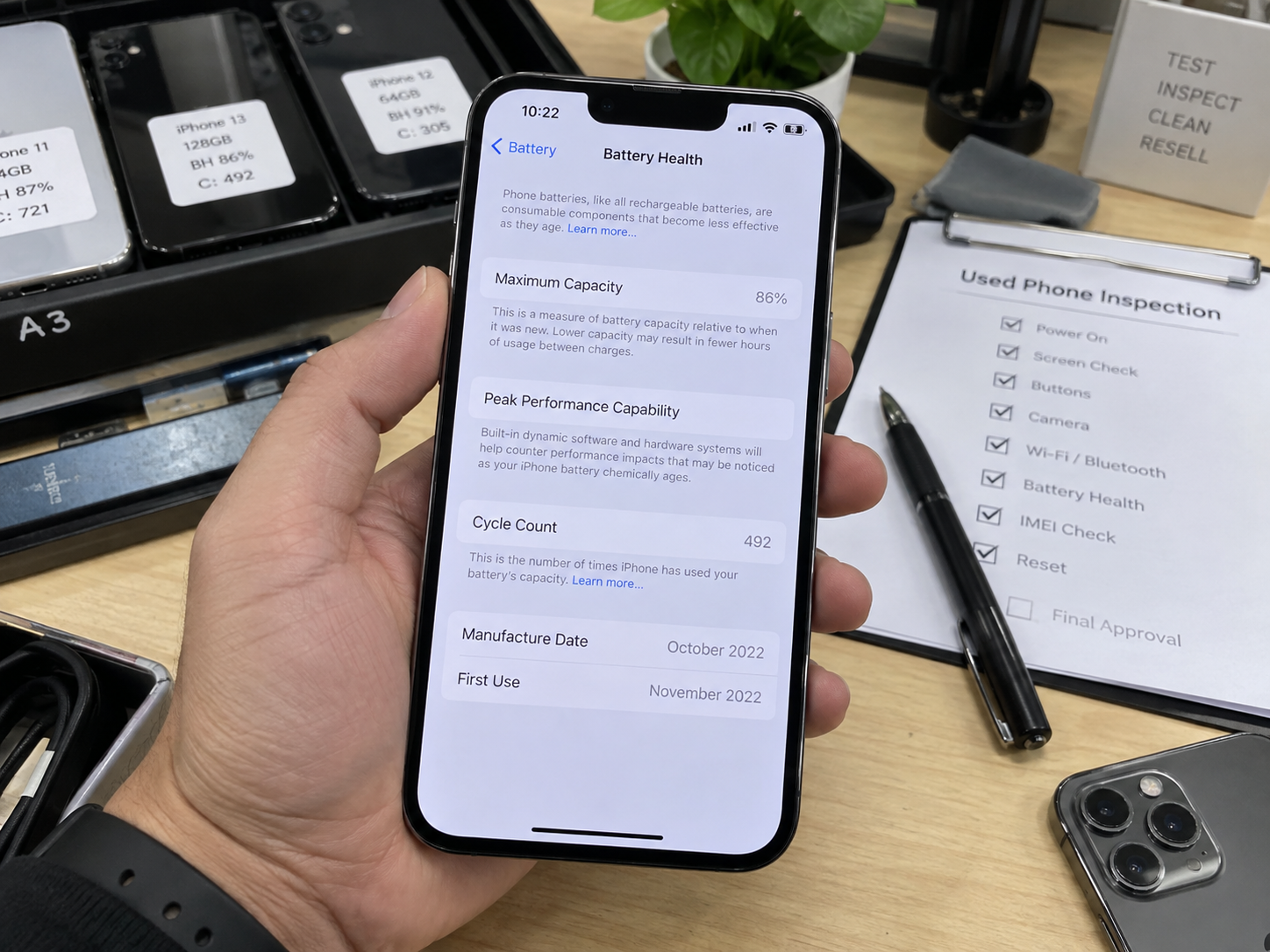 iPhone Battery Health screen showing Cycle Count during used-device inspection